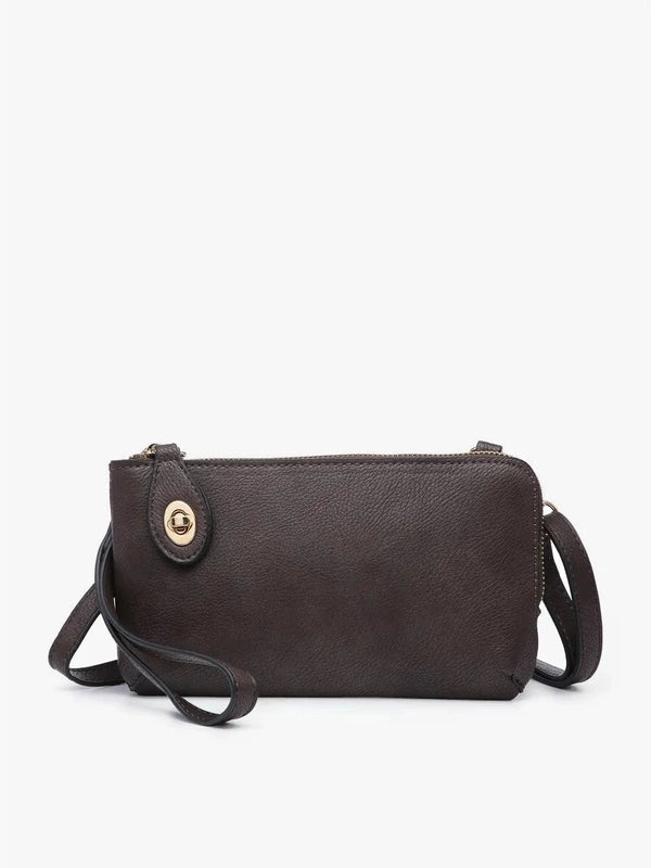 Brown leather crossbody bag on a white background